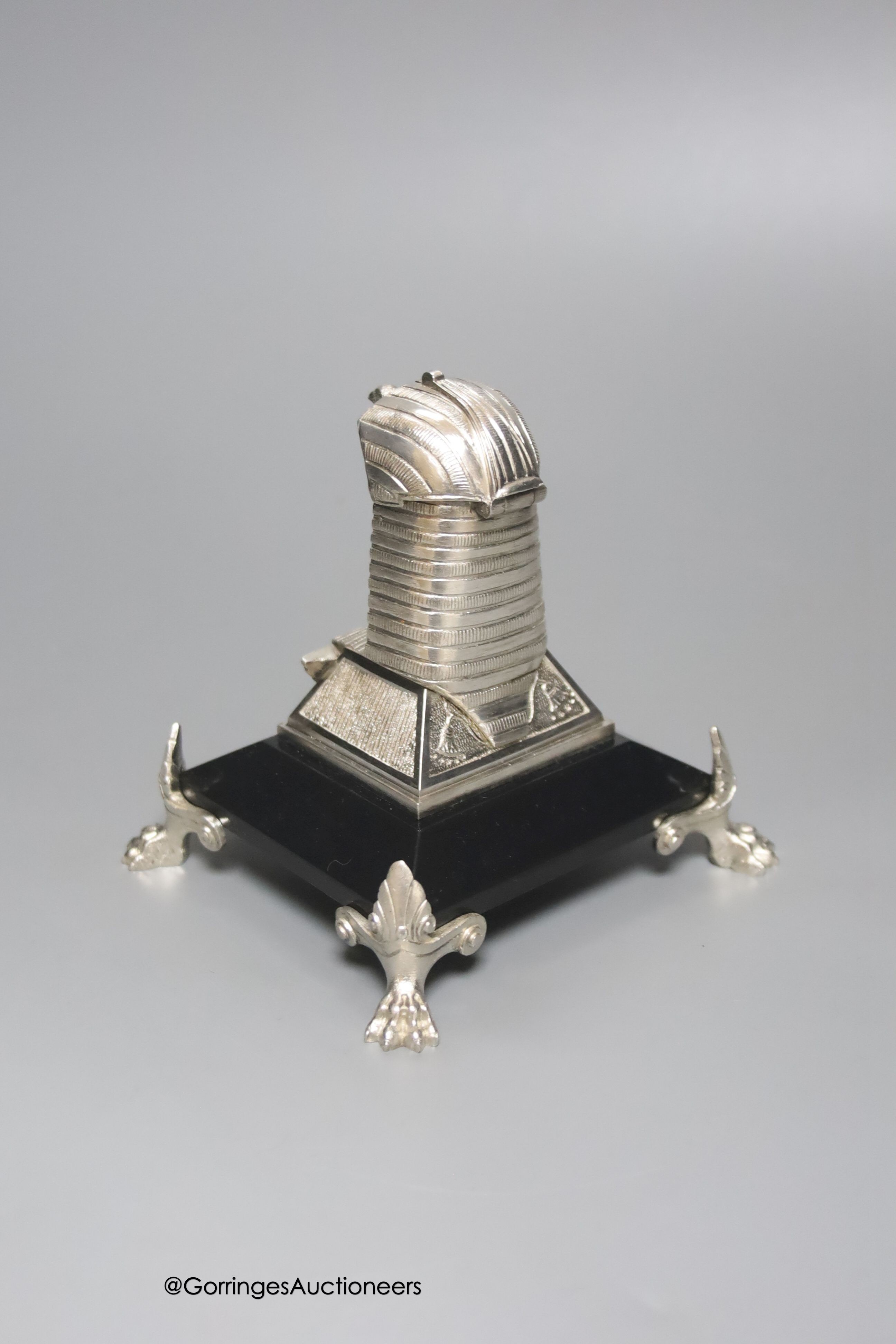 An Egyptian style electroplate mounted inkwell, height 12cm